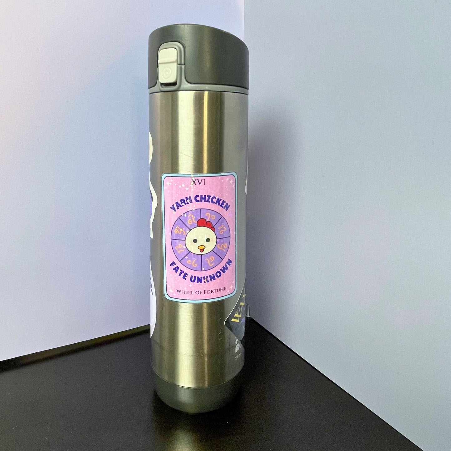 Water bottle with yarn chicken sticker