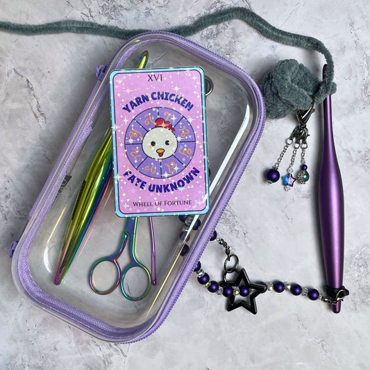 Purple tarot card sticker with a yarn chicken illustration.